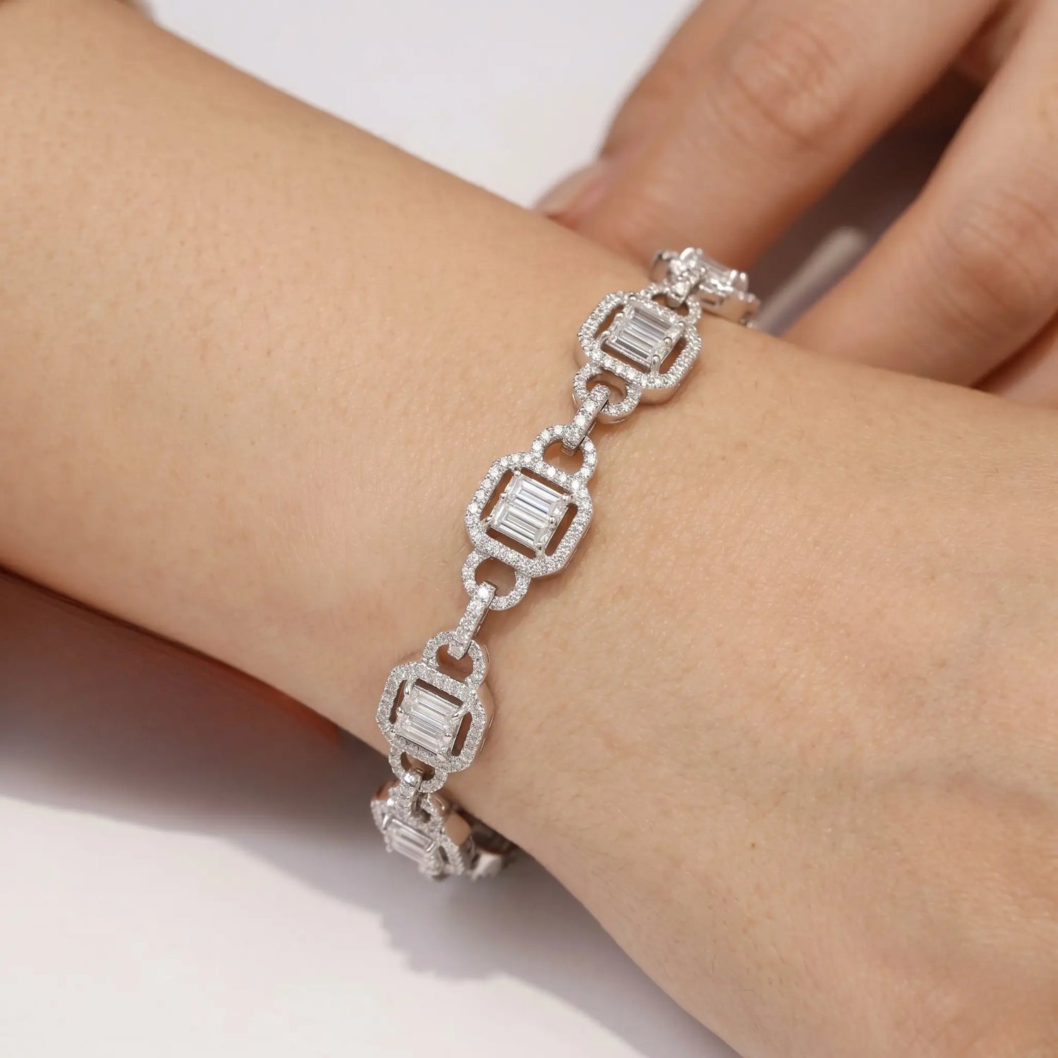 18K White Gold Baguette & Round Diamond Halo Tennis Bracelet – 2.46ctw