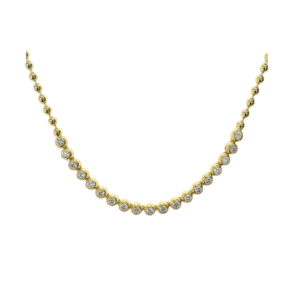 Gold necklace with embedded diamonds on a white background